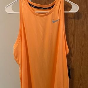 Women’s Nike Dri-Fit tank. New w/ tags. Size XL. Very lightweight.